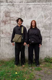 Models wearing FFUJJI Portra Shoulder bag black and green
